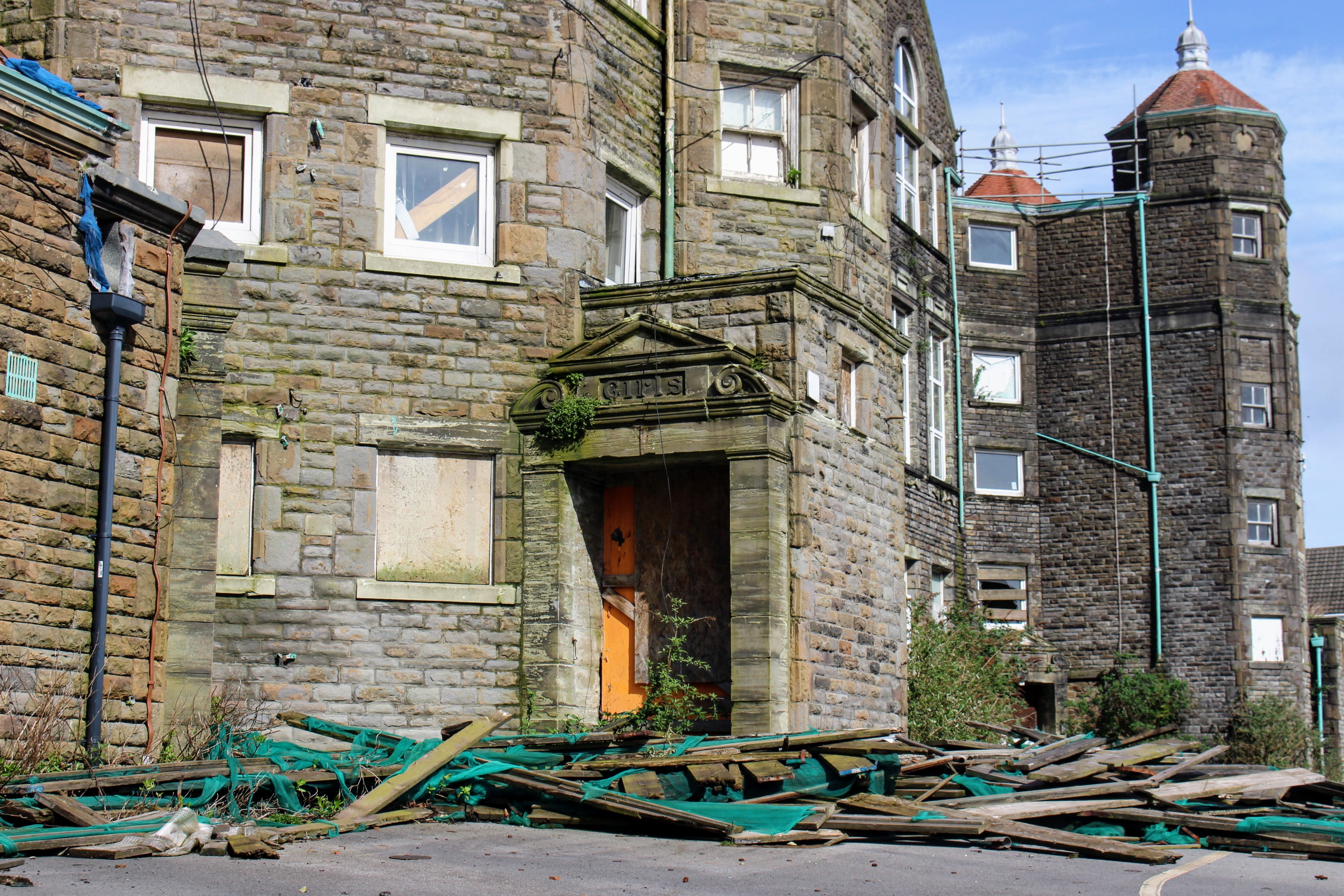 A disused and rotting door in a Swansea listed building.